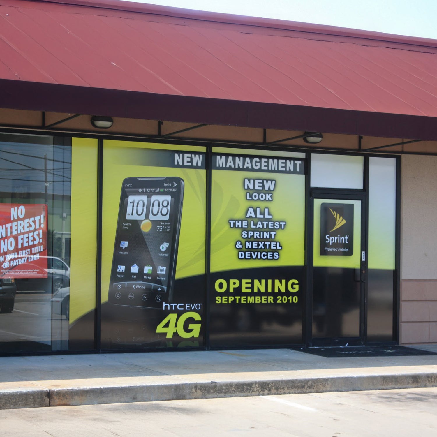 Sprint store front with promotional signs for HTC EVO 4G and new management.