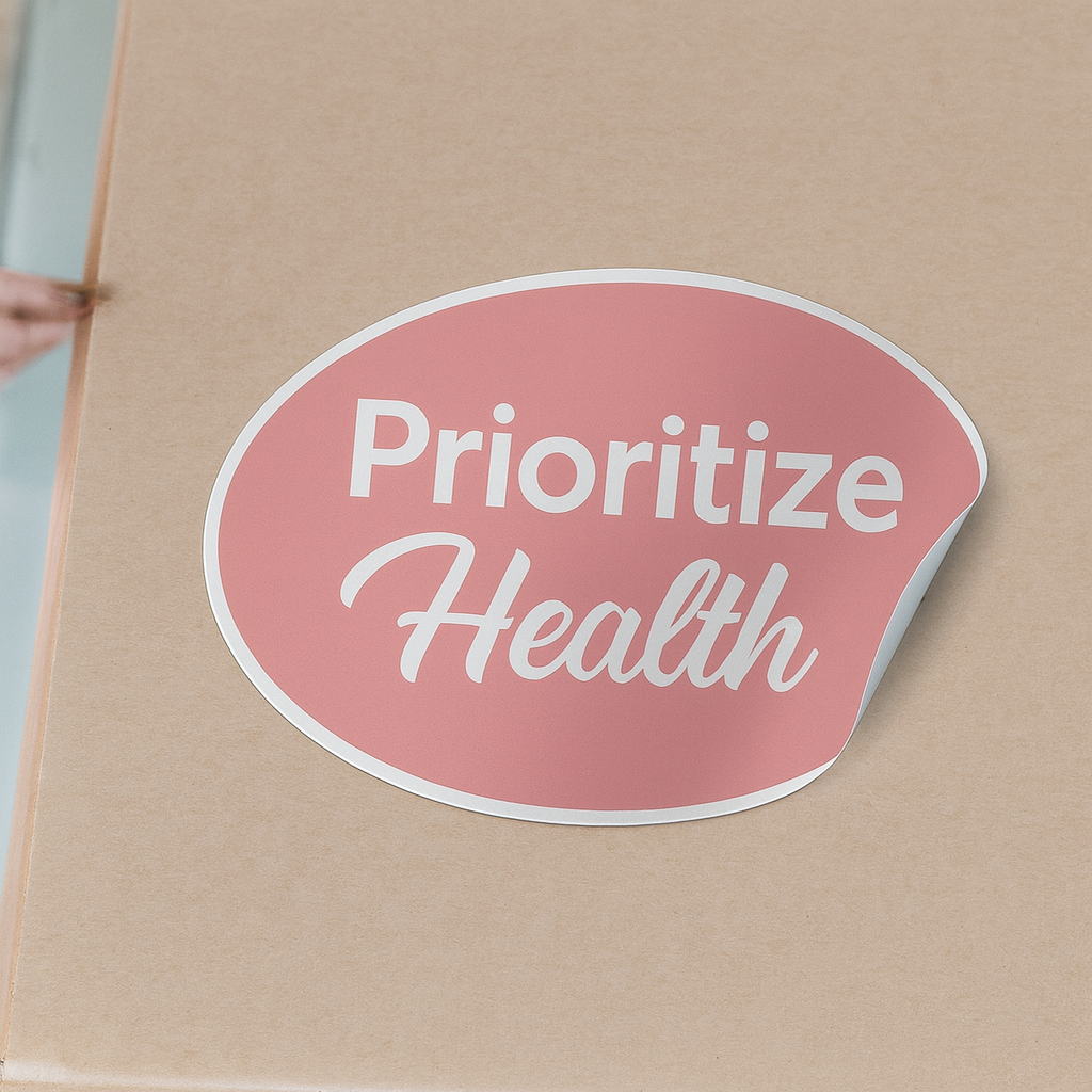 Cardboard box with a pink sticker that says 'Prioritize Health' on a beige background.