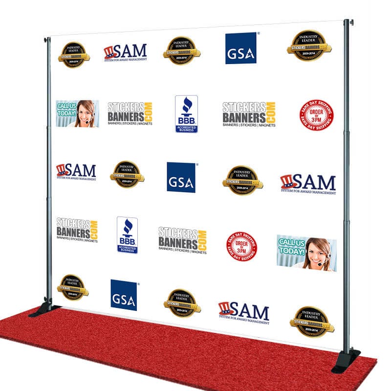 Step and repeat banner with various logos and branding on a white background