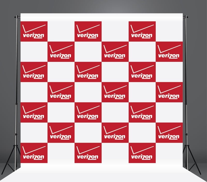 Verizon branded checkered backdrop with red and white squares on a gray background